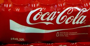 Coca-Cola earnings hit by strong dollar