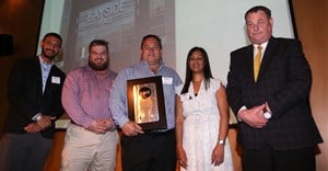 Receiving the 2015 Energy Efficiency Forum Award in the Large Building Retrofit category for Bayside Mall in Tableview, Cape Town, were; from left: Duane Petersen of Jefarres and Green (Pty) Ltd; Growthpoint Properties’ Steve Fourie, Pierre van Ryneveld and Aadilah Ryklief; with Cllr Johan van der Merwe, the City of Cape Town’s Mayoral Committee Member for Energy, Environmental and Spatial Planning.