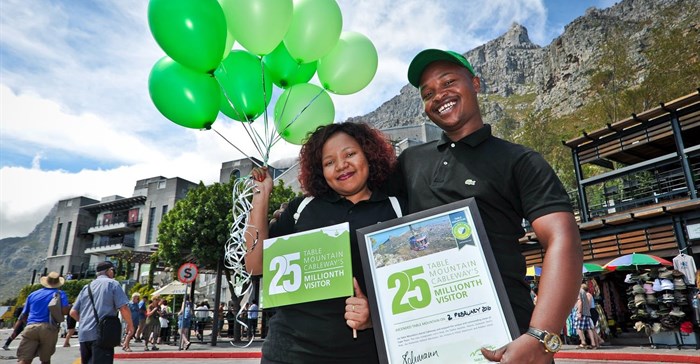 Cableway's 25 millionth visitor is all smiles