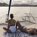 Sunbathing on catamaran A