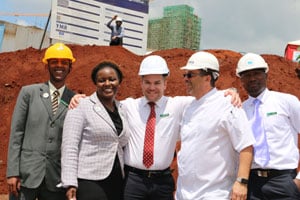 Standing on the City Lodge Hotel Two Rivers site in Nairobi are five members of the management team of the Fairview Hotel in Nairobi, which is also part of the City Lodge Hotel Group. They are (left to right): Collins Kimani, guest relations manager; Miriam Obegi, assistant general manager; Morne Bester, general manager; Mohsine Korich, executive chef; and John Munga, human resources coordinator. Watching from above is Caleb Omido, chief accountant.