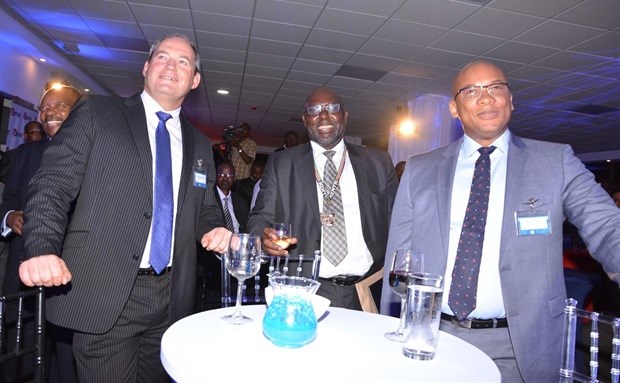 CEO of Interswitch EA Bernard Matthewman and Interswitch Plc Group CEO Mitchell Elegbe share a light moment during the Interswitch corporate brand unveil in Sept 2015