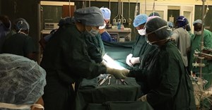 Doctors at Parirenyatwa Hospital in Zimbabwe prepare for surgery