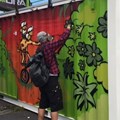 Street artist, Jace, at work