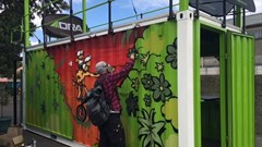 Street artist, Jace, at work