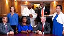 JG Afrika board: standing - Jan Norris, Seetella Makhetha, Phaks Ngqumshe, Martha Makhetha; seated - Harold Tiganis, Nomsa Mkaza, Paul Olivier (MD)