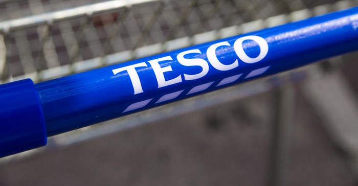 Tesco rebounds into slender annual net profit