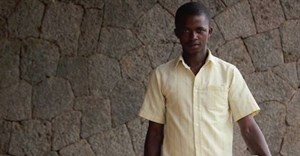 Master Mason Hakiza Emmanuel worked on the volcanic stone facades of the Butaro Hospital, Rwanda.