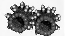 Nano-architects design materials that can work together at very tiny scales, like these interlocking gears made of carbon tubes and benzene molecules.