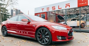 Tesla accelerates to hit target of making 500,000 cars