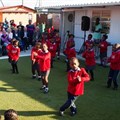 Learners of the Khululeka Early Childhood Development (ECD) Centre dancing in celebration of their newly upgraded facility thanks to the Rotary Club of Claremont's Injongo Project, in partnership with the Lewis Group. [Photo credit: Slingshot Media]
