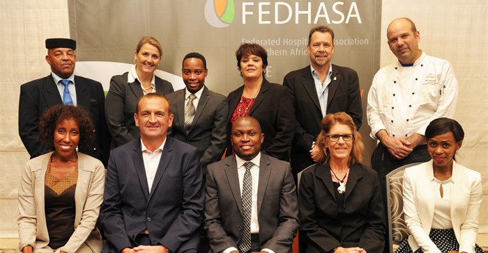 Seated row from left to right: Ruth Kamau (Small Accommodation segment Chair), Rob Kucera (FEDHASA Cape Chairperson), Tshifhiwa Tshivhengwa (National CEO), Karin Augustyn (Trusted Partners segment Alternate), Noli Mini (Young Professionals segment Chair)<p>Standing row from left to right: Terence Lategan (Restaurant & Catering segment Alternate), Sissel Tellefsen (Small Accommodation segment Alternate), Marvin Rashopola (Young Professionals segment Alternate), Rema Wiese (Fedhasa Cape Executive Officer), Chris Godenir (Hotels segment Alternate) and Carl van Rooyen (Restaurant & Catering segment Chair). (Absent on this picture: Jeff Rosenberg (Hotel segment Chair) & Alan Lester (Trusted Partners Chair).