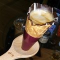 Signature coffee in a cone at The Grind Coffee Company
