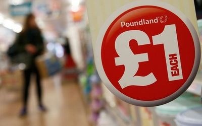 A sign is seen in a Poundland store in London.<p>Picture: