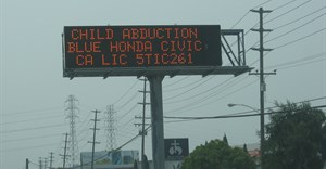 Amber Alert sign: Another example of the use of DOOH to locate missing/abducted children. Image ©  from Honolulu, Hawaii - ,