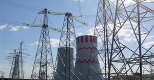 Pylons carry electricity power lines past cooling towers at the Novovoronezh NPP-2 nuclear power station, operated by OAO Rosenergoatom, a unit of Rosatom, in Novovoronezh, Russia.
Picture: