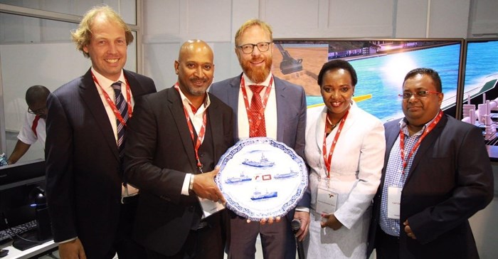 TNPA chief executive Richard Vallihu (2nd from left) accepts a token of appreciation from Royal IHC, flanked by Philip van den Broek (Royal IHC Project Manager), Berth-Jan de Keijzer (Royal IHC Manager of Supplier Development Programme), Transnet Group Chief HR Officer Nonkululeko Sishi and TNPA Head of Dredging Services, Carl Gabriel. - Stephen Railton