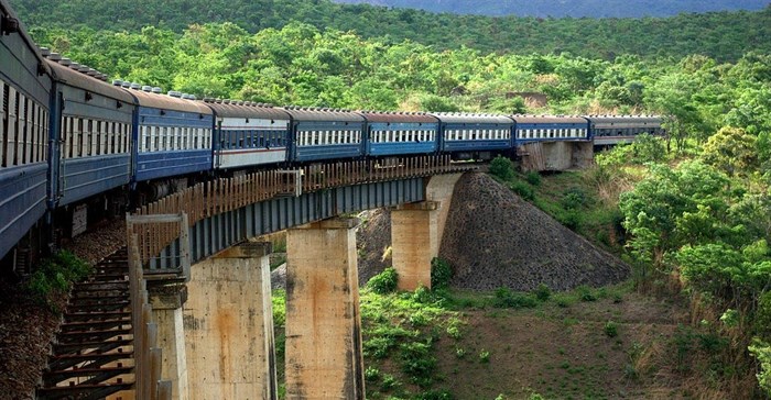 Richard Stupart via  - TAZARA Railway crossing a bridge near the Zambian-Zimbabwean border.