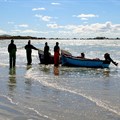 Octagon via  - Fishermen selling their catch of the day at the beach of Paternoster, Western Cape