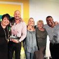 Celia Collins from Carat, handing over the 2016 MOST award for best media owner – cinema category award to the Cinemark sales team – Claire Smith, Eric Blignaut, Kim Cox, Lynne Marshall and Leslie Adams.