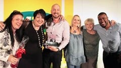 Celia Collins from Carat, handing over the 2016 MOST award for best media owner – cinema category award to the Cinemark sales team – Claire Smith, Eric Blignaut, Kim Cox, Lynne Marshall and Leslie Adams.