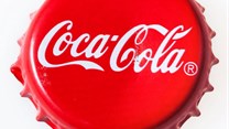 Coke signs at schools 'encourage sugar use'