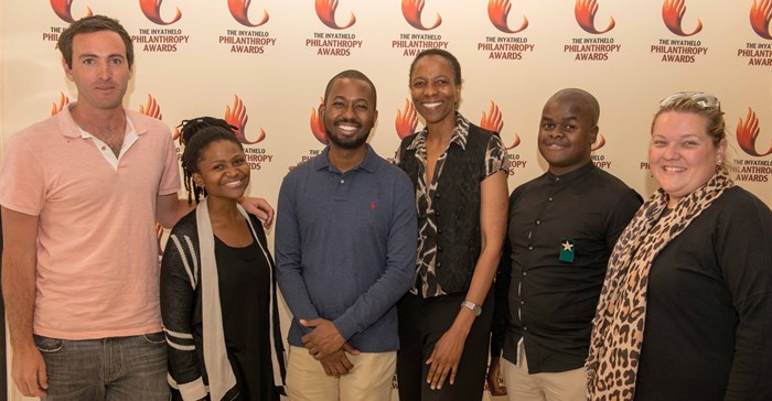 L-R: Awardees Tim Conibear and Lusanda Gwayi, guest speaker Sangu Delle, Inyathelo acting executive director Nomfundo Walaza, and awardees Neftaly Malatjie and Katherine Brink. (Absent: awardee Dianna Yach, on behalf of the Yach family.) Pic credit: Andrew Brown.