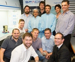 The core team that built SCS Aerospace Group's nSight1 nanosatellite in a record time of six months are at the front from left to right: Louis Muller, Dr. Francois Malan, Kannas Wiid, Rikus Cronje, Hendrik Burger; in the middle David Brill; and at the back Heinrich Fuchs, Premie Pillay, Philip Bellsted, Dr Lourens Visagie, Kevin Gema and Marcello Bartolini.