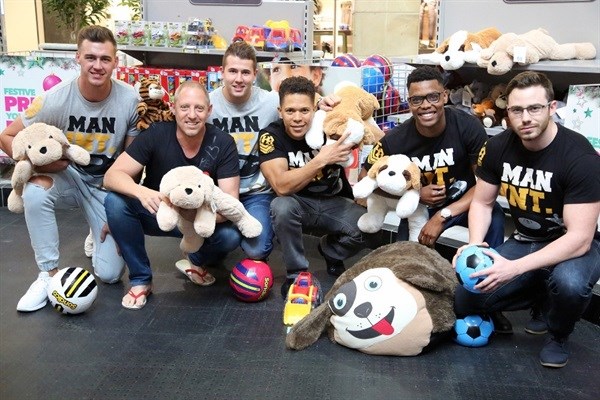 East Coast Radio’s Damon Beard and the Man International Models at the East Coast Radio Toy Story with Game Corporate Day Challenge.