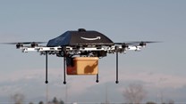 An Amazon picture of a flying &quot;octocopter&quot; mini-drone that would be used to fly small packages to consumers ()