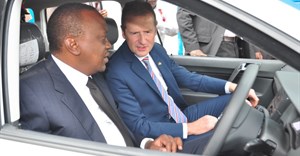Kenya president Uhuru Kenyatta and Dr Herbert Diess, CEO of the Volkswagen brand, preparing to drive the first Polo Vivo built in Kenya off the assembly line.