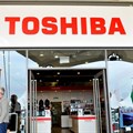 Toshiba shares fall 20% after it flags one-off loss