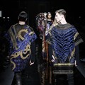 Model present creations by Balmain during men's Fashion Week for the Fall/Winter 2017/2018 collection in Paris on 21 January 2017 ()