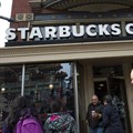 Starbucks plans to hire 10,000 refugees worldwide over the next five years in response to President Donald Trump's travel ban, the head of the US coffee-chain company said | © AFP/File |