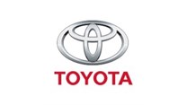 Toyota 9-month net profit falls but hikes annual outlook