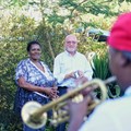 Hanekom enjoys some local music with business owner and community member Sienna Charles on the Dwars River Escape Route. Image: Open Africa