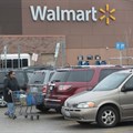 Walmart's new cuts will affect employees in the international division, its technology services division and in its Sam's Club business ()