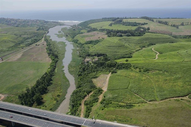 An aerial view of the uMdloti River from the N2 to the sea.