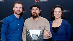 Sunshine co's digital sales manager, Willem Foster, Zeno Petersen (winner) and Karlien Murray from AtPhoto