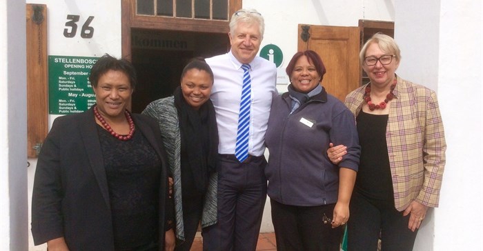 Minister Alan Winde (Western Cape Minister of Economic Opportunities) joined Annemarie Ferns (CEO of Stellenbosch 360) on the right and some of her colleagues at the town’s Visitors Centre to celebrateStellenbosch’s ICCA rating