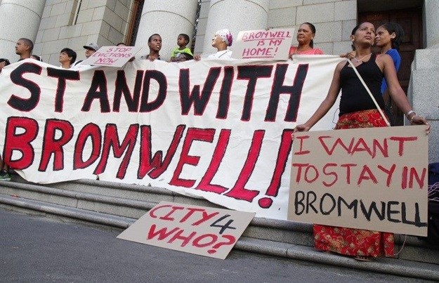 Bromwell Street residents and members from Reclaim the City picket outside the Western Cape High Court before their court hearing in January. Photo: Ashraf Hendricks