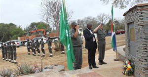 The Ranger Services staff perform the guard of honour for the KNP Rangers. Approaching the Ranger monument and laying the wreath at the ceremony are MEC: Community Safety, Security and Liaison, Mpumalanga Province, Mr Petrus Ngomane (middle), Chief Ranger, Nicholus Funda, and Head Ranger Ken Maggs from the KNP Ranger Services Department. Senior members of the South African Police Service, South African National Defence Force and South African National Parks Honorary Rangers formed part of the ceremonial wreath laying.