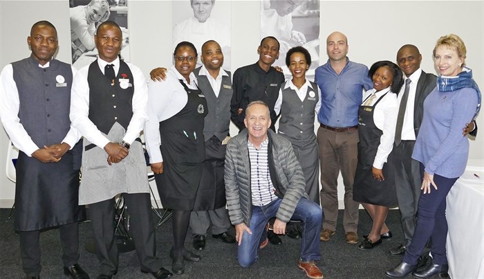 Candidate Wine Stewards with three of the judges. At the back judges from left to right: Higgo Jacobs (Chairman of the South African Sommeliers Association, Sandy Harper (CWM and International Wine Judge) and in front Germain Lehodey (CWM and Sommelier at Mosaic Restaurant)