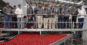 The Bigbucks and Two-a-Day team with the first fruit packed for export