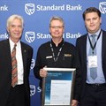 Wynter Murdoch (left), convenor of the Innovations Award competition, Philip Lutz, of Monroe, and Konstantin von Vieregge, CEO of Messe Frankfurt SA