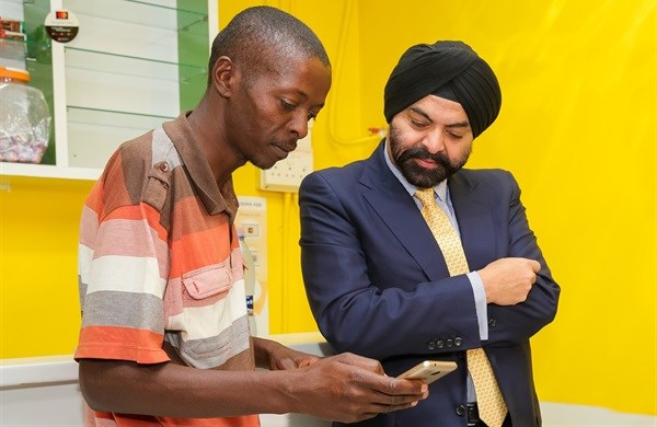 Mastercard president and CEO Ajay Banga visited Paul Makeleke, owner of Kasi Convenience Food and Internet Café in Alexandra, Johannesburg to see how the Spazapp is working for him.