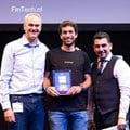 Oradian co-founder Julian Oehrlein on stage at the European FinTech event in Brussels accepting the award for Europe's Most Innovative Banking Software.