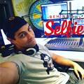 Strydom captions this: “Chilling out in the Smile 90.4FM studios!”