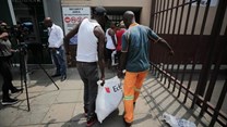 Customers queue to return meat to the Enterprise factory store in Germiston, east of Johannesburg, on 5 March 2018. Image: Alaister Russell/The Sunday Times