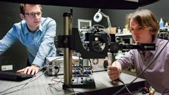 Stanford researchers David Lindell (left) and Matt O’Toole work on a laser-based system that can detect hidden objects around corners (Credit: L.A. Cicero)